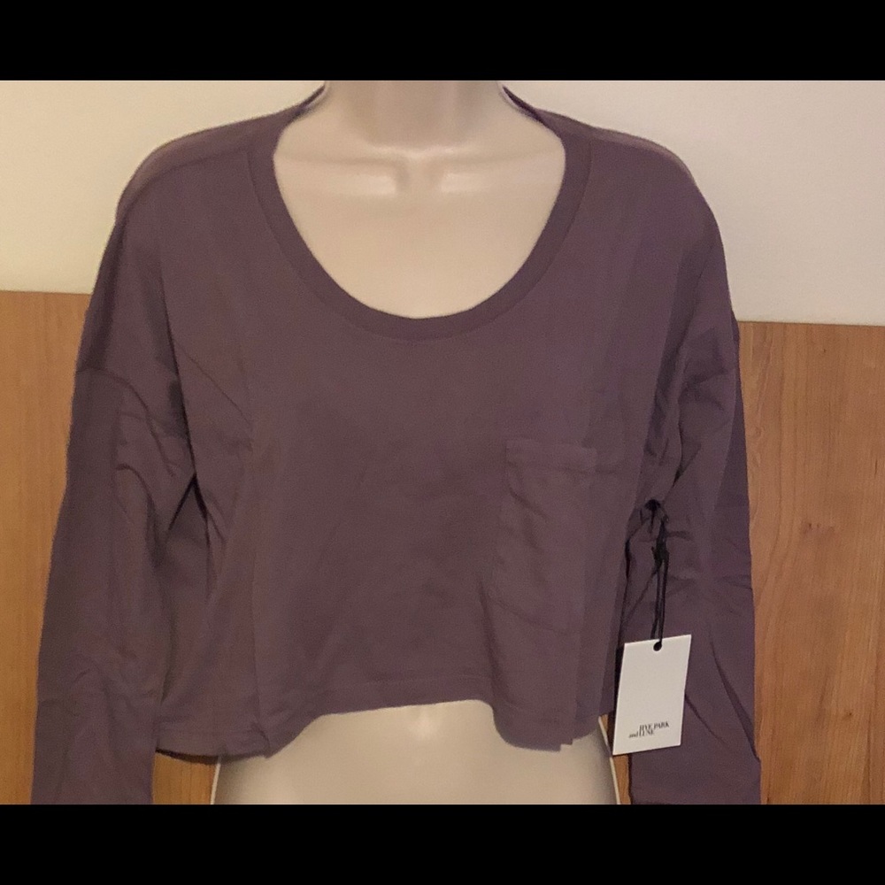 Hye Park and Lune pocket long sleeve cropped top